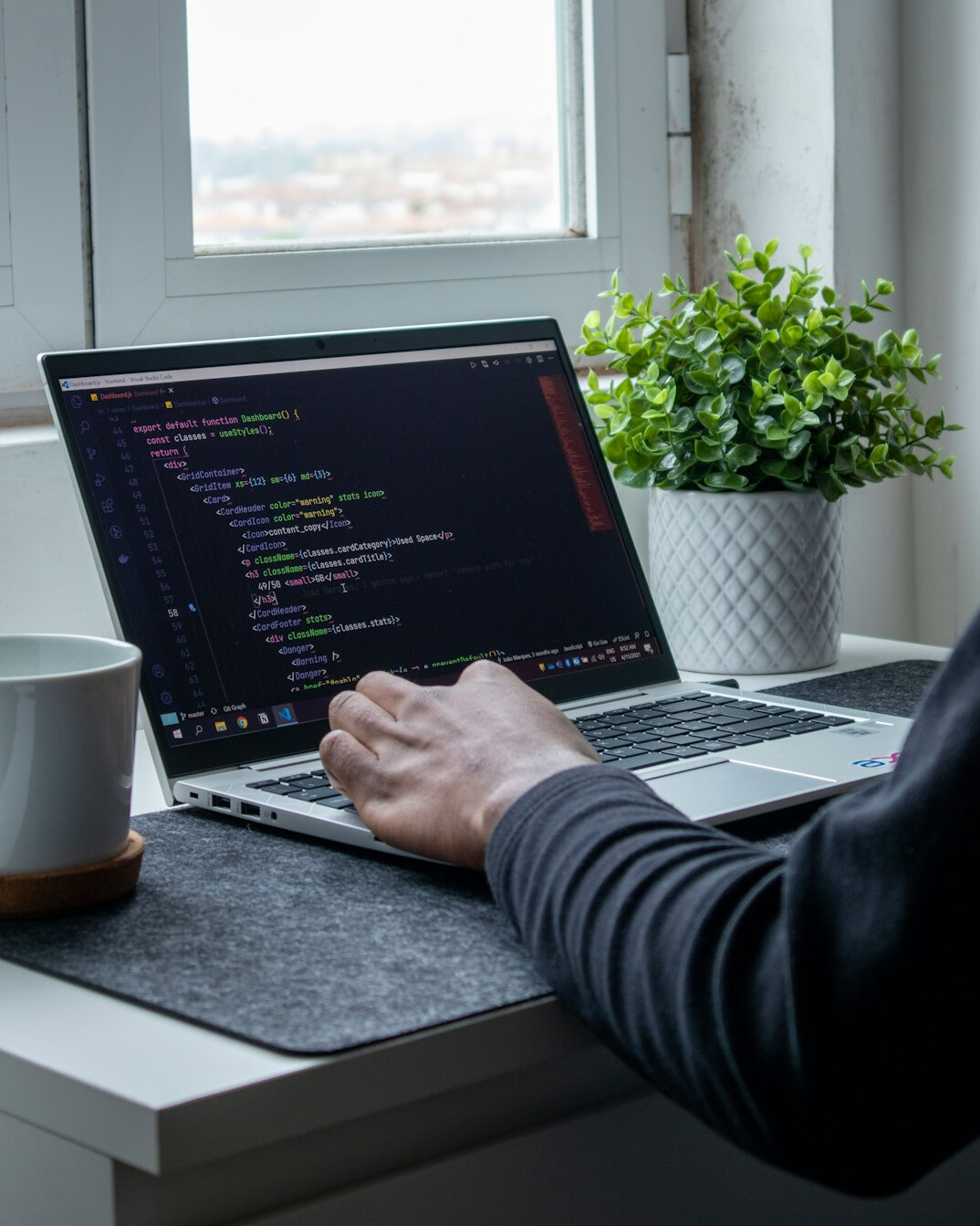 person taking online programming course
