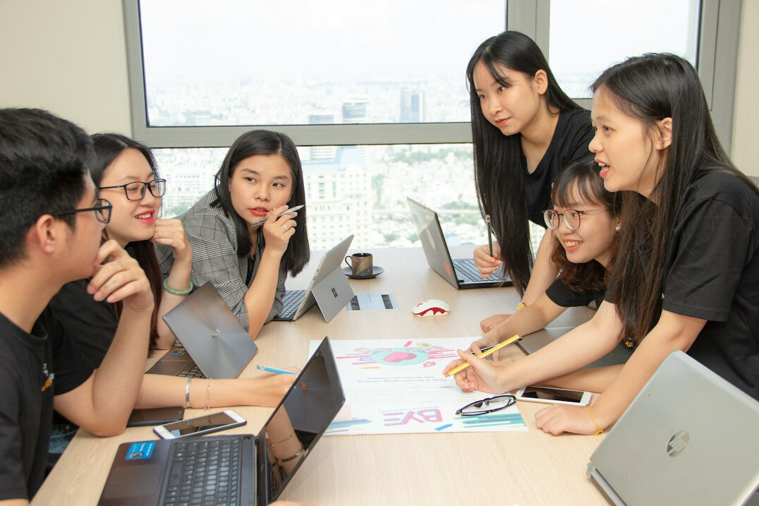 group of coders collaborating
