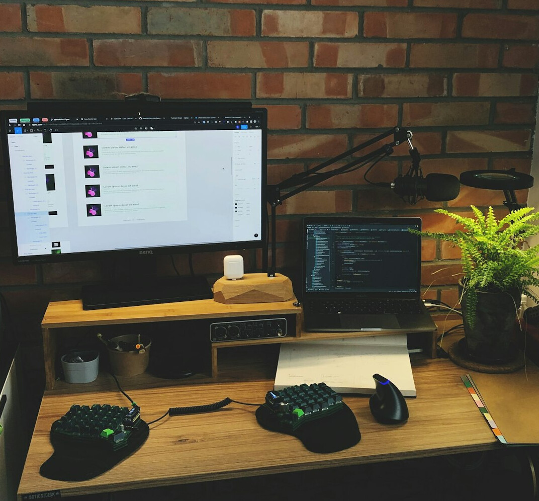 Team of developers working together at a shared desk